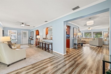 Located in Mainlands of Tamarac by the Gulf, this updated on Mainlands Golf Club in Florida - for sale on GolfHomes.com, golf home, golf lot