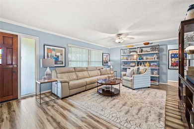 Located in Mainlands of Tamarac by the Gulf, this updated on Mainlands Golf Club in Florida - for sale on GolfHomes.com, golf home, golf lot