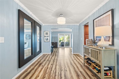 Located in Mainlands of Tamarac by the Gulf, this updated on Mainlands Golf Club in Florida - for sale on GolfHomes.com, golf home, golf lot