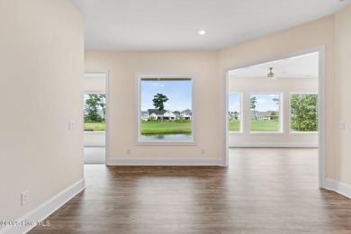 Brand-new and never lived in, this custom-built home in on Cape Fear National At Brunswick Forest in North Carolina - for sale on GolfHomes.com, golf home, golf lot
