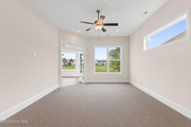 Brand-new and never lived in, this custom-built home in on Cape Fear National At Brunswick Forest in North Carolina - for sale on GolfHomes.com, golf home, golf lot