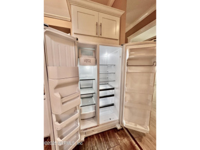 This updated 1-story, 3 bdrm/2 bath duplex home is located in on Halifax Plantation Golf Club in Florida - for sale on GolfHomes.com, golf home, golf lot