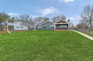 This stunningly reimagined lakeside retreat is a perfect fusion on Lake Kiowa Golf Course in Texas - for sale on GolfHomes.com, golf home, golf lot