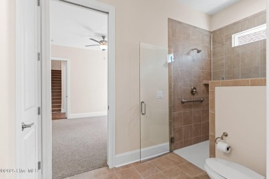 Brand-new and never lived in, this custom-built home in on Cape Fear National At Brunswick Forest in North Carolina - for sale on GolfHomes.com, golf home, golf lot