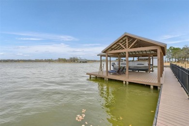 This stunningly reimagined lakeside retreat is a perfect fusion on Lake Kiowa Golf Course in Texas - for sale on GolfHomes.com, golf home, golf lot