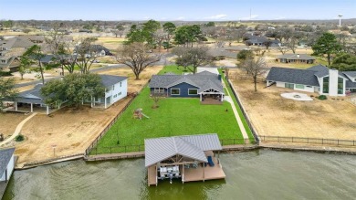 This stunningly reimagined lakeside retreat is a perfect fusion on Lake Kiowa Golf Course in Texas - for sale on GolfHomes.com, golf home, golf lot