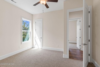 Brand-new and never lived in, this custom-built home in on Cape Fear National At Brunswick Forest in North Carolina - for sale on GolfHomes.com, golf home, golf lot