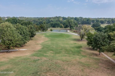Build your home in the Country Club....an area in rolling hills on Nevada Country Club in Missouri - for sale on GolfHomes.com, golf home, golf lot