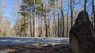 This lot offers great mountain views and Sky Valley city on Sky Valley Resort and Country Club in Georgia - for sale on GolfHomes.com, golf home, golf lot