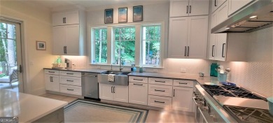 With beautiful lake views, this home is located in the sought on Reynolds Lake Oconee - The Oconee in Georgia - for sale on GolfHomes.com, golf home, golf lot