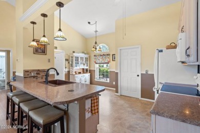 Come and see this spacious 3-bedroom home with private back yard on Sandpiper Bay Golf and Country Club in North Carolina - for sale on GolfHomes.com, golf home, golf lot