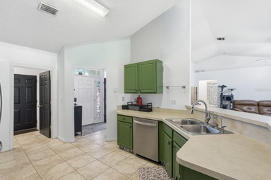 Beautiful and well-maintained 4-bedroom, 2-bath home located in on Grand Club Matanzas in Florida - for sale on GolfHomes.com, golf home, golf lot