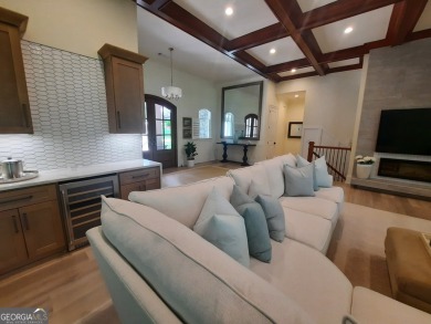 With beautiful lake views, this home is located in the sought on Reynolds Lake Oconee - The Oconee in Georgia - for sale on GolfHomes.com, golf home, golf lot