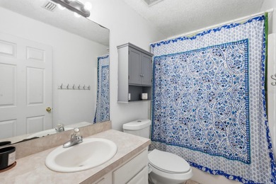 Beautiful and well-maintained 4-bedroom, 2-bath home located in on Grand Club Matanzas in Florida - for sale on GolfHomes.com, golf home, golf lot