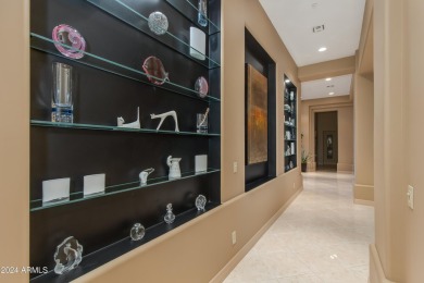 Contemporary elegance abounds in this custom masterpiece in on Troon North Golf Club  in Arizona - for sale on GolfHomes.com, golf home, golf lot