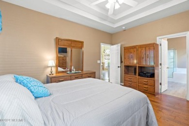 Come and see this spacious 3-bedroom home with private back yard on Sandpiper Bay Golf and Country Club in North Carolina - for sale on GolfHomes.com, golf home, golf lot