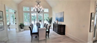 With beautiful lake views, this home is located in the sought on Reynolds Lake Oconee - The Oconee in Georgia - for sale on GolfHomes.com, golf home, golf lot