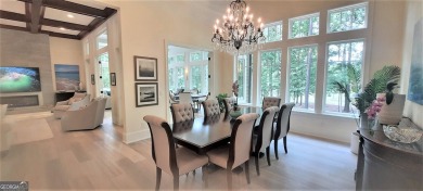 With beautiful lake views, this home is located in the sought on Reynolds Lake Oconee - The Oconee in Georgia - for sale on GolfHomes.com, golf home, golf lot