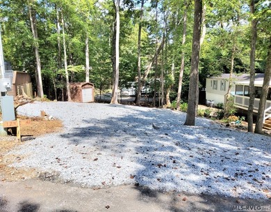 Great vacant  lot ready for your home. Lot has been mostly on River Ridge Golf Club in Virginia - for sale on GolfHomes.com, golf home, golf lot