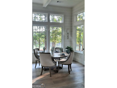 With beautiful lake views, this home is located in the sought on Reynolds Lake Oconee - The Oconee in Georgia - for sale on GolfHomes.com, golf home, golf lot