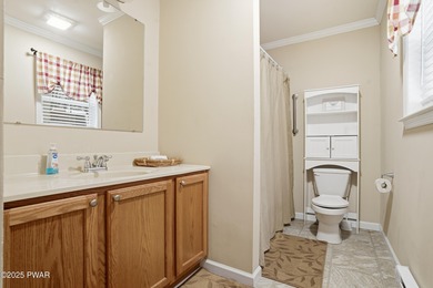 Welcome to your new Poconos getaway! This turn-key ranch in The on The Hideout Golf in Pennsylvania - for sale on GolfHomes.com, golf home, golf lot