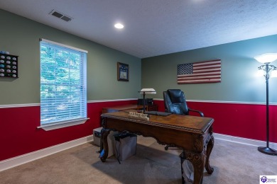 Don't let the exterior fool you--this Cape Cod-style home may on Doe Valley Country Club in Kentucky - for sale on GolfHomes.com, golf home, golf lot