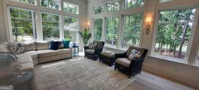 With beautiful lake views, this home is located in the sought on Reynolds Lake Oconee - The Oconee in Georgia - for sale on GolfHomes.com, golf home, golf lot