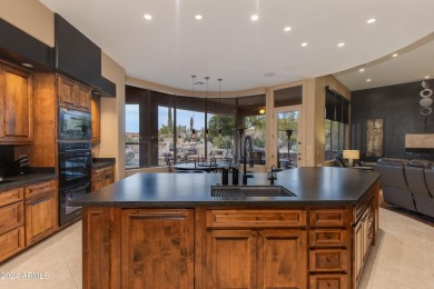 Contemporary elegance abounds in this custom masterpiece in on Troon North Golf Club  in Arizona - for sale on GolfHomes.com, golf home, golf lot