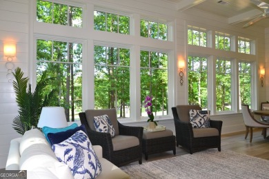 With beautiful lake views, this home is located in the sought on Reynolds Lake Oconee - The Oconee in Georgia - for sale on GolfHomes.com, golf home, golf lot