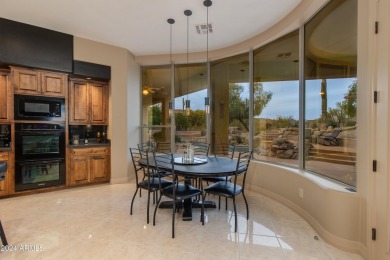 Contemporary elegance abounds in this custom masterpiece in on Troon North Golf Club  in Arizona - for sale on GolfHomes.com, golf home, golf lot