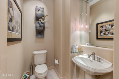 Contemporary elegance abounds in this custom masterpiece in on Troon North Golf Club  in Arizona - for sale on GolfHomes.com, golf home, golf lot