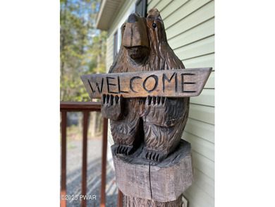 Welcome to your new Poconos getaway! This turn-key ranch in The on The Hideout Golf in Pennsylvania - for sale on GolfHomes.com, golf home, golf lot