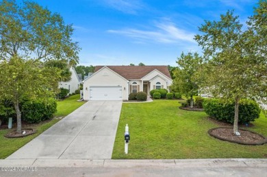 Come and see this spacious 3-bedroom home with private back yard on Sandpiper Bay Golf and Country Club in North Carolina - for sale on GolfHomes.com, golf home, golf lot