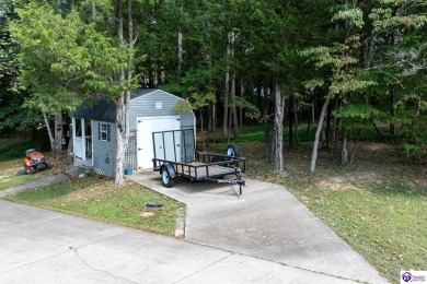 Don't let the exterior fool you--this Cape Cod-style home may on Doe Valley Country Club in Kentucky - for sale on GolfHomes.com, golf home, golf lot