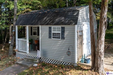 Don't let the exterior fool you--this Cape Cod-style home may on Doe Valley Country Club in Kentucky - for sale on GolfHomes.com, golf home, golf lot