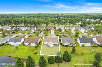 Come and see this spacious 3-bedroom home with private back yard on Sandpiper Bay Golf and Country Club in North Carolina - for sale on GolfHomes.com, golf home, golf lot