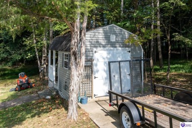 Don't let the exterior fool you--this Cape Cod-style home may on Doe Valley Country Club in Kentucky - for sale on GolfHomes.com, golf home, golf lot