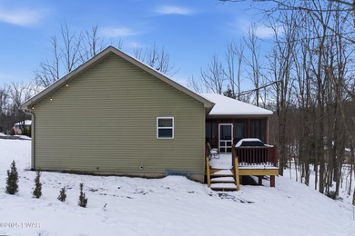 Welcome to your new Poconos getaway! This turn-key ranch in The on The Hideout Golf in Pennsylvania - for sale on GolfHomes.com, golf home, golf lot
