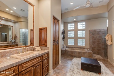 Contemporary elegance abounds in this custom masterpiece in on Troon North Golf Club  in Arizona - for sale on GolfHomes.com, golf home, golf lot