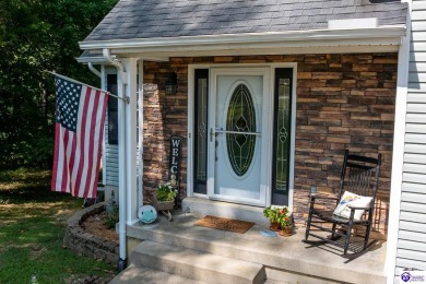 Don't let the exterior fool you--this Cape Cod-style home may on Doe Valley Country Club in Kentucky - for sale on GolfHomes.com, golf home, golf lot