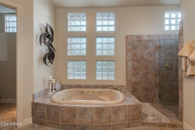 Contemporary elegance abounds in this custom masterpiece in on Troon North Golf Club  in Arizona - for sale on GolfHomes.com, golf home, golf lot