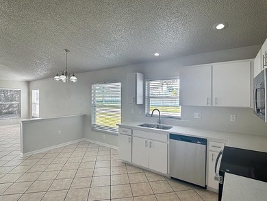 Stunning Golf Course Home in Lexington Oaks - Affordable Luxury on Lexington Oaks Golf Club in Florida - for sale on GolfHomes.com, golf home, golf lot