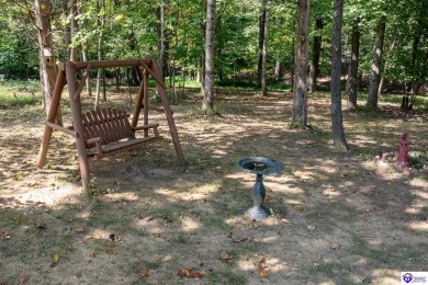 Don't let the exterior fool you--this Cape Cod-style home may on Doe Valley Country Club in Kentucky - for sale on GolfHomes.com, golf home, golf lot