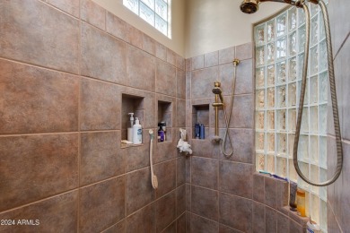 Contemporary elegance abounds in this custom masterpiece in on Troon North Golf Club  in Arizona - for sale on GolfHomes.com, golf home, golf lot