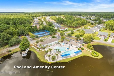 Come and see this spacious 3-bedroom home with private back yard on Sandpiper Bay Golf and Country Club in North Carolina - for sale on GolfHomes.com, golf home, golf lot