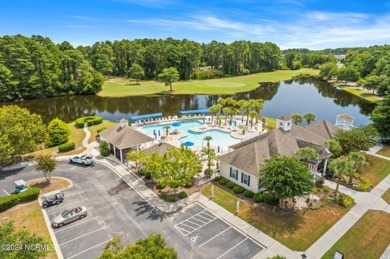 Come and see this spacious 3-bedroom home with private back yard on Sandpiper Bay Golf and Country Club in North Carolina - for sale on GolfHomes.com, golf home, golf lot