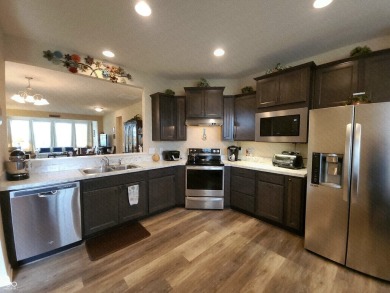 Hang up the work and enjoy the play in this 55+ Del Webb on Oaktree Golf Course in Indiana - for sale on GolfHomes.com, golf home, golf lot
