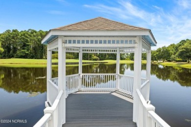 Come and see this spacious 3-bedroom home with private back yard on Sandpiper Bay Golf and Country Club in North Carolina - for sale on GolfHomes.com, golf home, golf lot