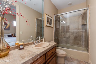 Contemporary elegance abounds in this custom masterpiece in on Troon North Golf Club  in Arizona - for sale on GolfHomes.com, golf home, golf lot