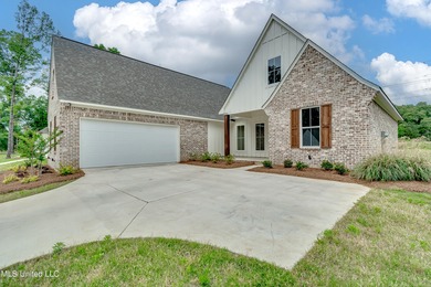 Welcome to 122 Grayson Way in Lake Caroline -- a beautifully on Lake Caroline Golf Club in Mississippi - for sale on GolfHomes.com, golf home, golf lot